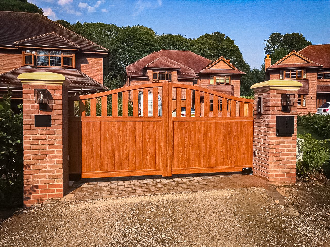 golden oak wooden effect aluminium gates swing driveway